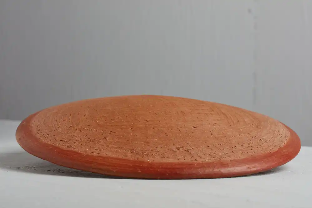 Medium size comal made from red clay in San Marcos Tlapazola, Oaxaca.