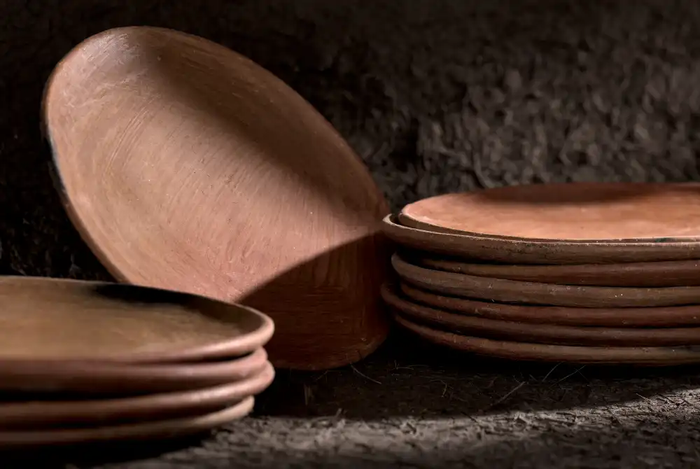 Detail of bottom of medium size comal made from red clay in San Marcos Tlapazola, Oaxaca.