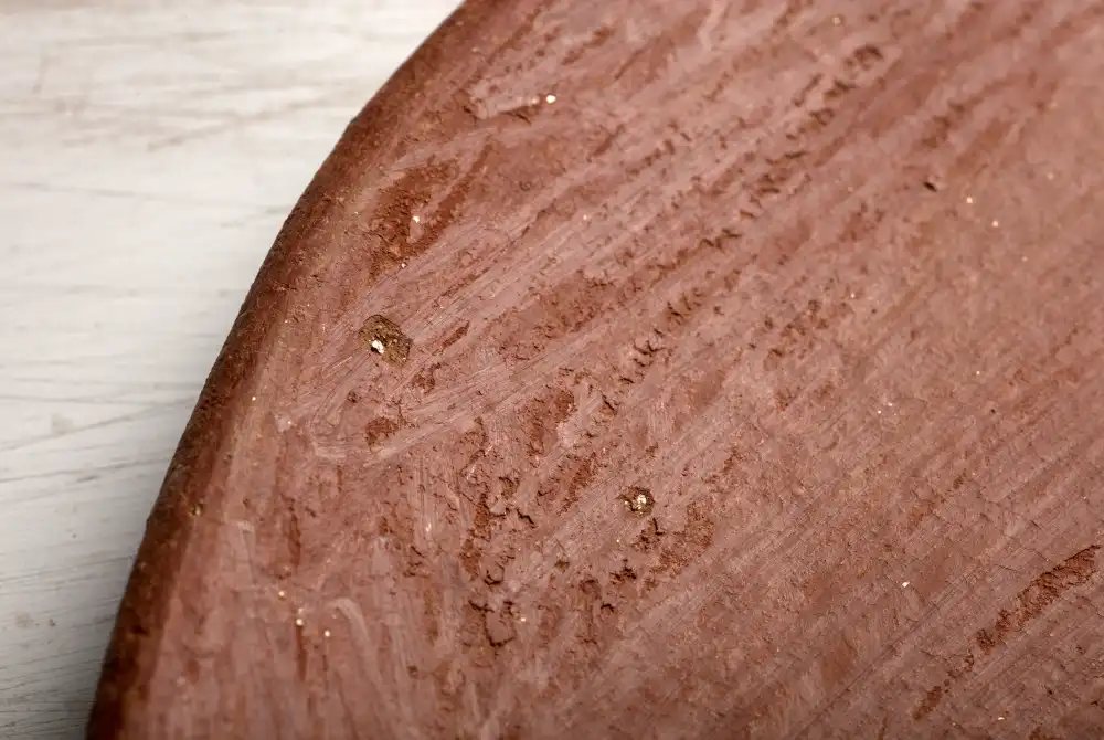 Detail of top of medium size comal made from red clay in San Marcos Tlapazola, Oaxaca.